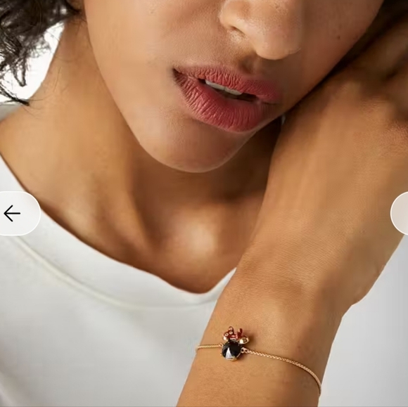 kate spade Jewelry - Kate Spade Gold Bracelet with Black and Red Charm